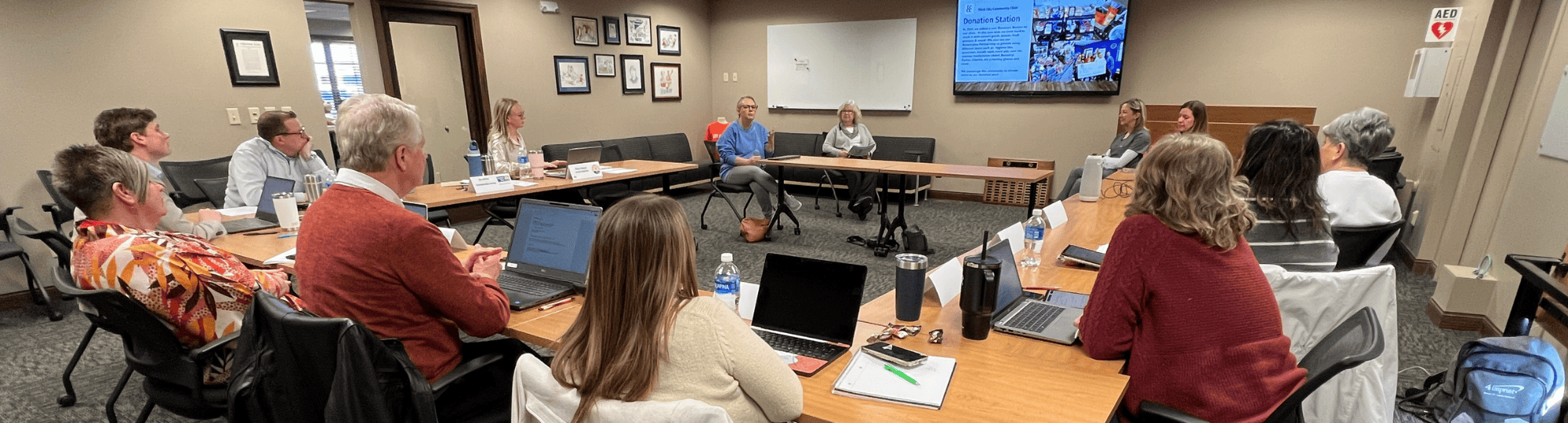 Volunteers gather in the Heartland United Way conference room for Community Investment.