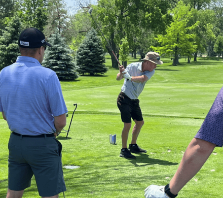 Golfers tee off during the Heartland United Way Golf Tournament in 2025.