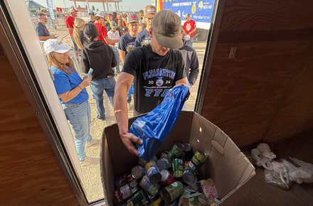 A FFA member drops off his donated food at Husker Harvest Days 2025.