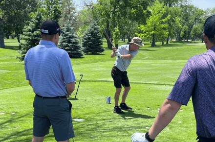 Golfers tee off during the Heartland United Way Golf Tournament in 2025.