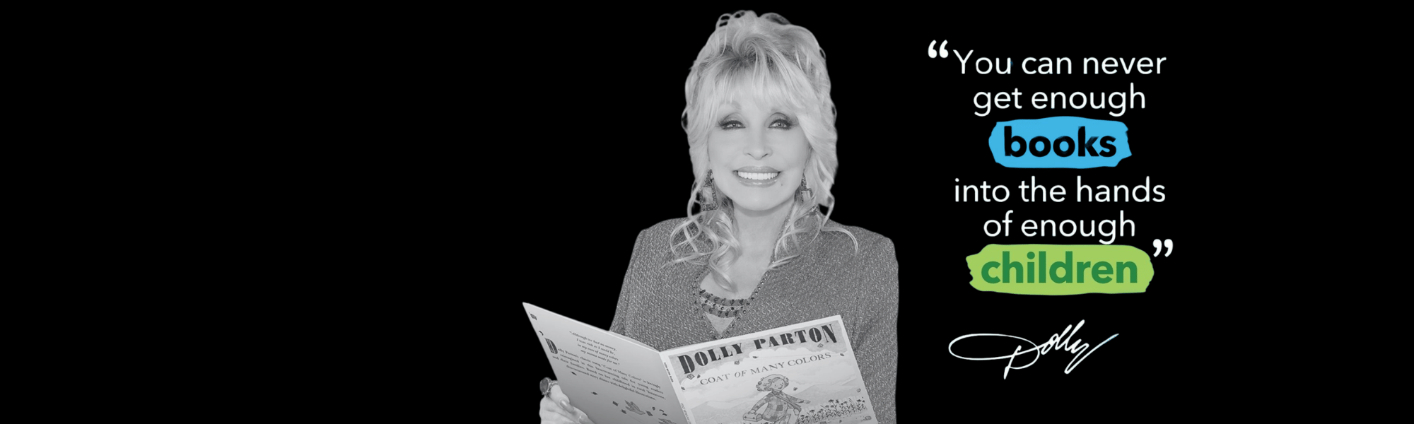 Dolly Parton holds her book "Coat of Many Colors"