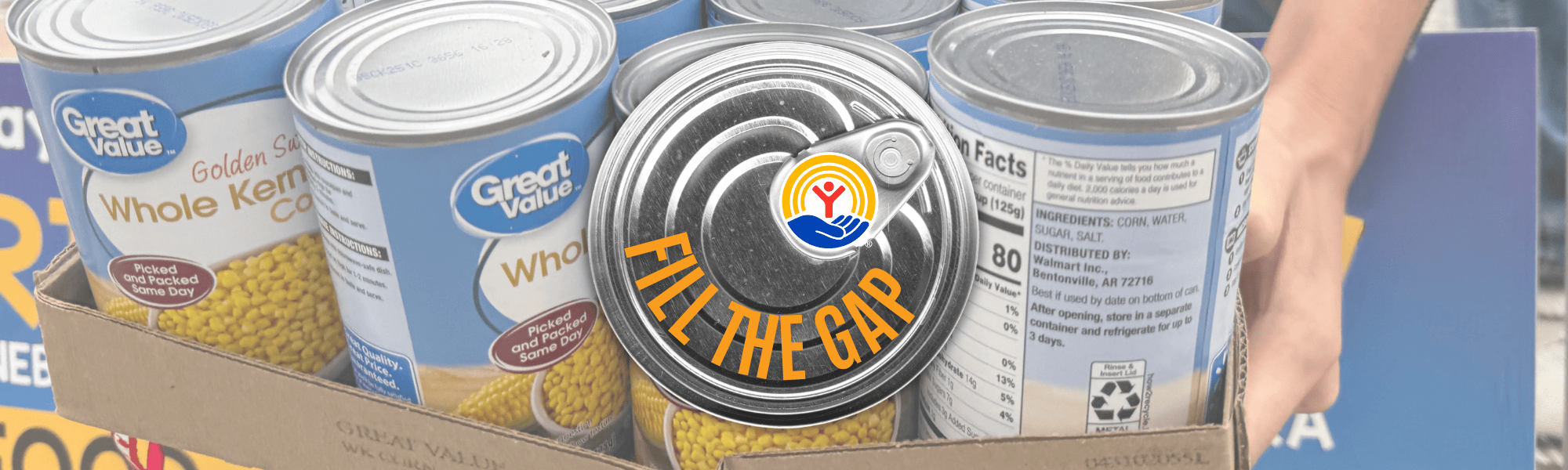 The words Fill the Gap on a can of food over multiple cans being set down.
