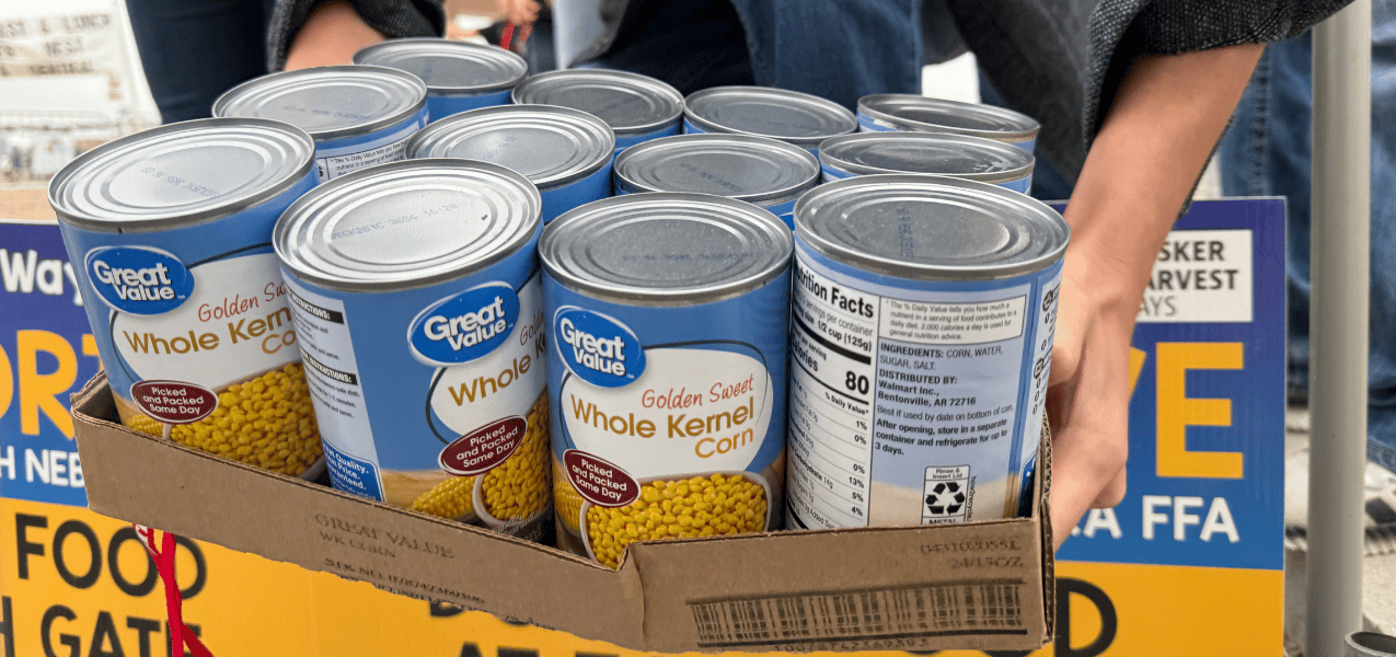 Cans being donated to a Food Drive