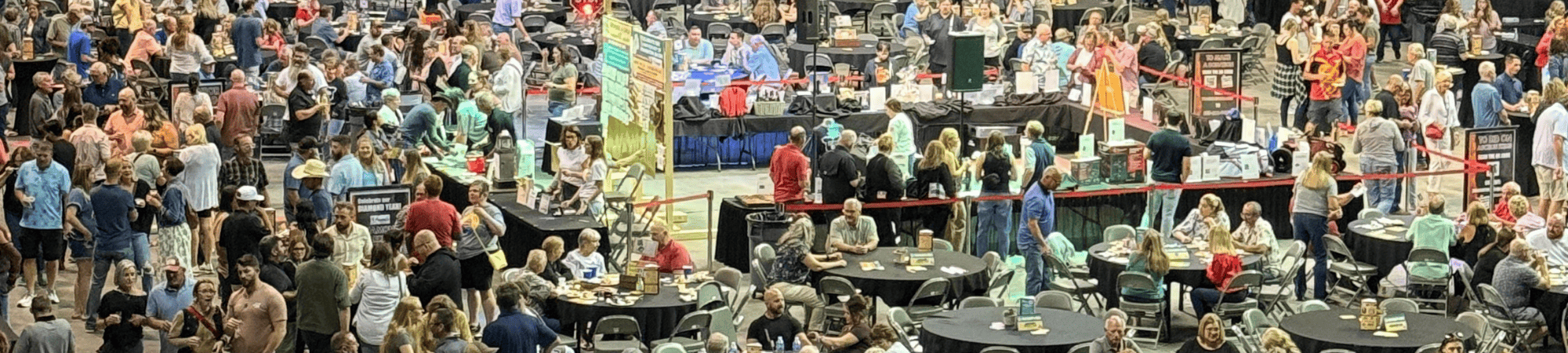 The crowd at Imagination Bacon 2025 fills the floor of the Heartland Events Center.