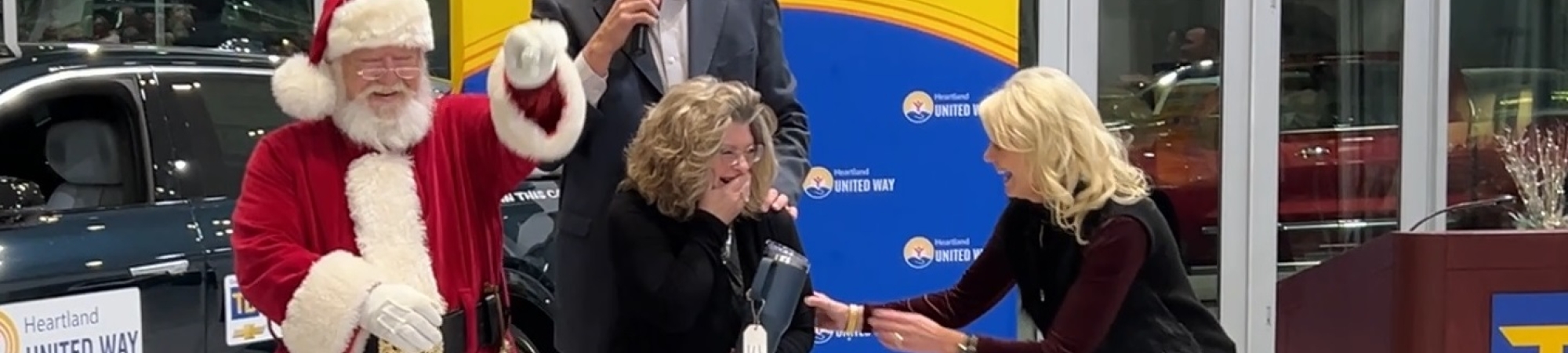 Sandy Mead learns she has won a new all electric Cadillac LYRIQ Luxury 2 during 25 Keys of Christmas.
