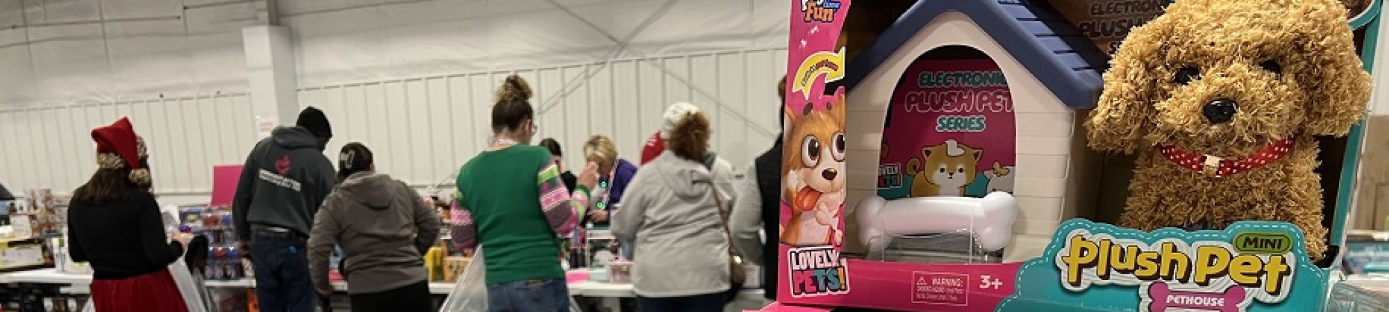 Families pick out toys during 2024 Holiday Toy Distribution.